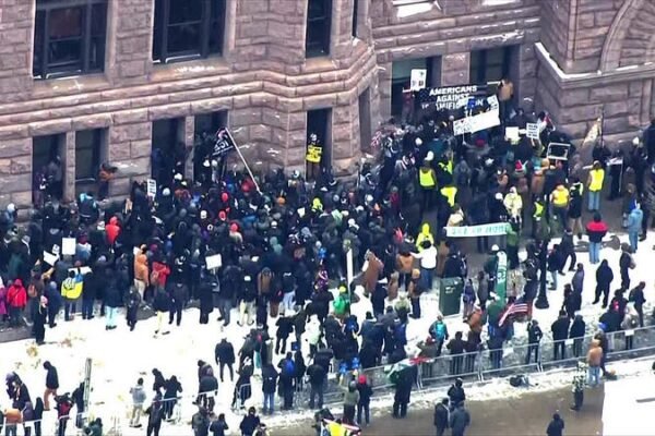 Tensions rise in Minneapolis as right-wing influencer faces counter-protest